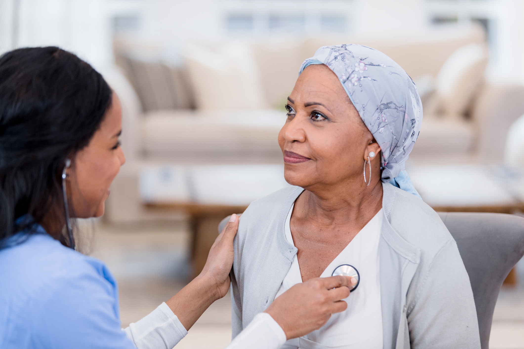 A doctor checks a patient's hearth health.