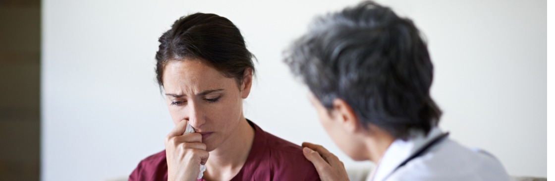 Doctor Comforting Patient