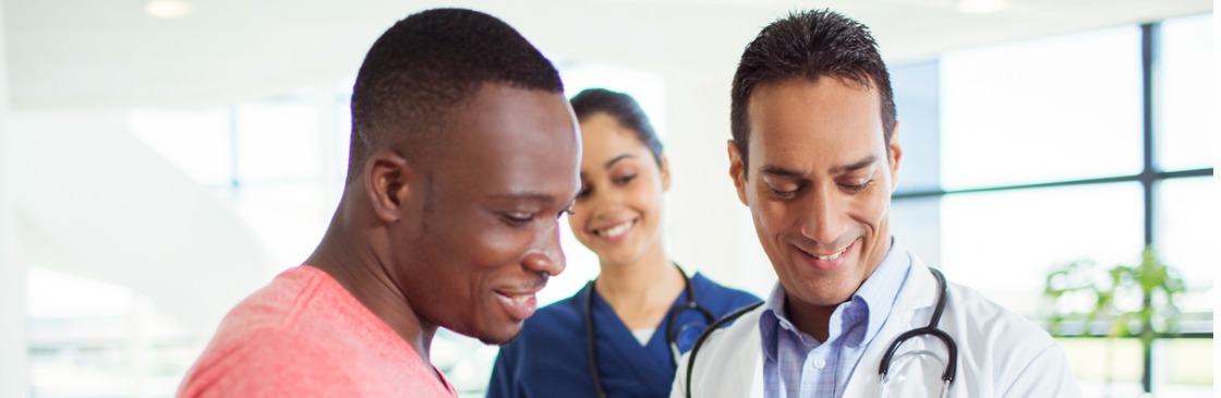 Doctor talking to adult patient